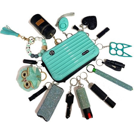 Safety keychain featuring self-defense and emergency preparedness accessories.