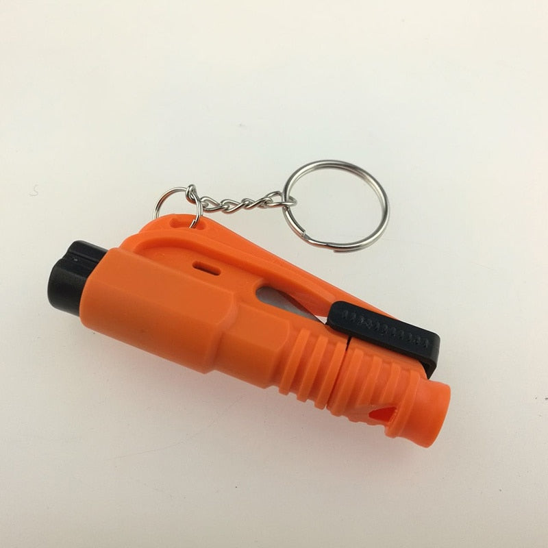 Orange safety hammer with black accents and a keychain on a white background