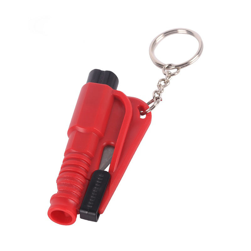 Red and black car window breaker with keychain on a white background