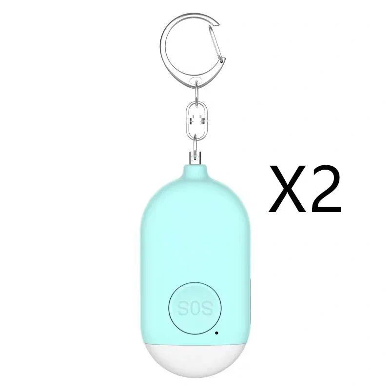 Light blue keychain device with SOS button on a white background